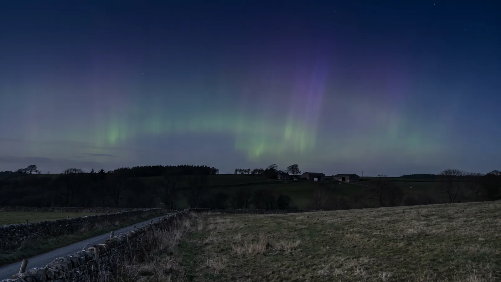 Solar storms, the aurora and the grid: a calm UK guide